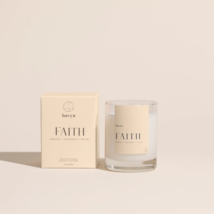 picture of a 2oz candle with the words "faith" printed.